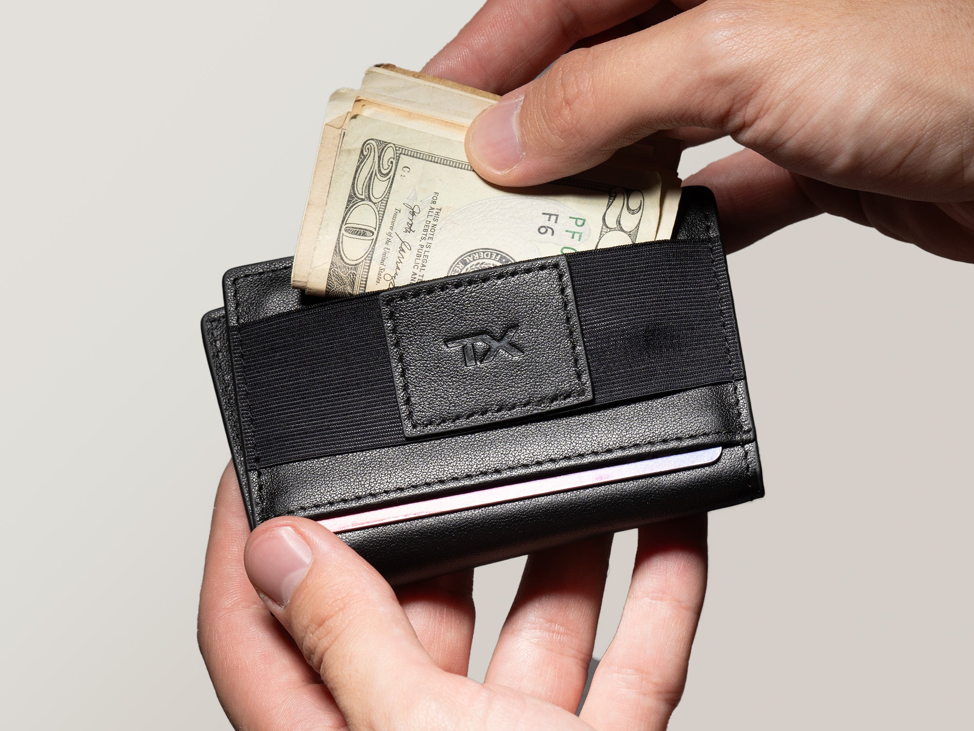 titan x wallet bifold cash strap use