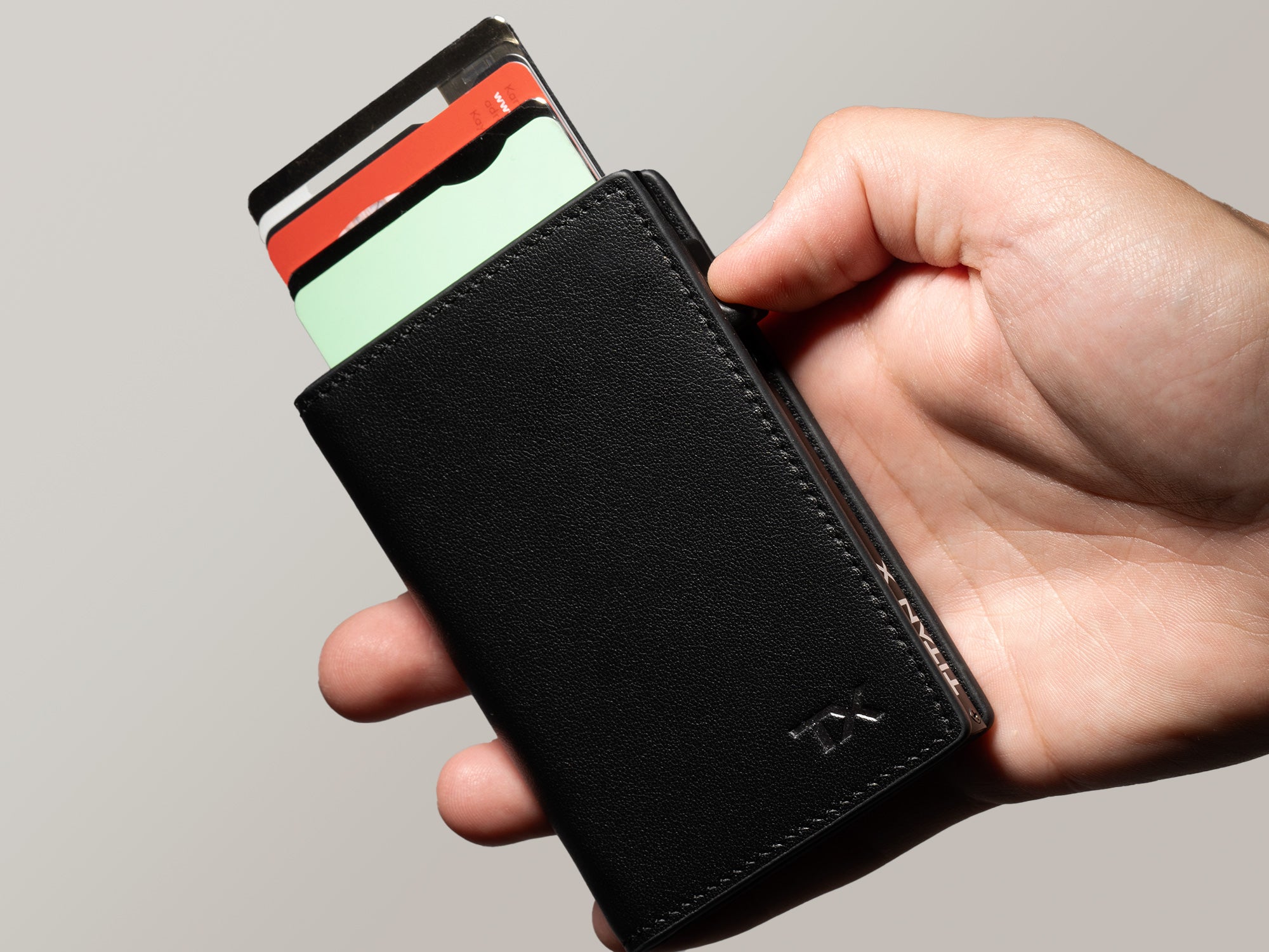 titan x trifold black leather wallet card exposure with quick acess